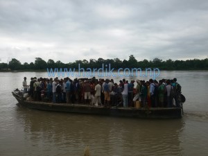 People crossing Karnali river by Steamer. 